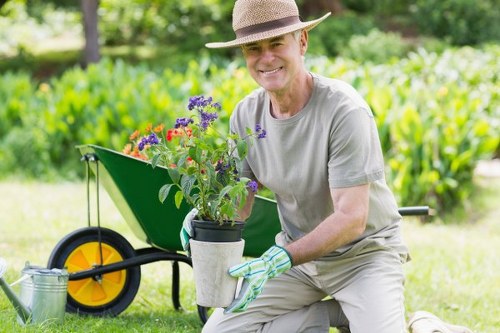 Low-emission electric van parked beside garden site